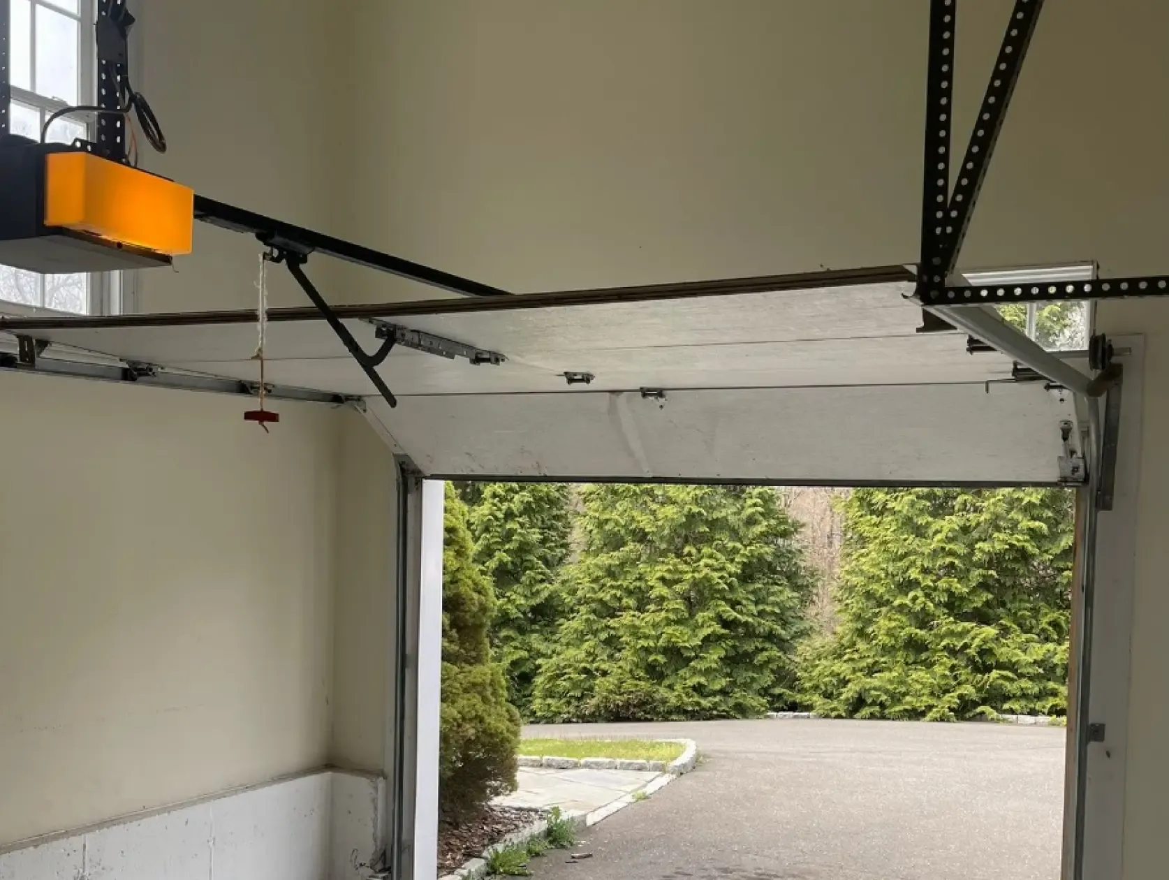 A Complete Guide to Garage Door Track Maintenance